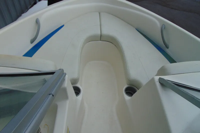 Slide: The Image of 2007 Bayliner 175 Bowrider interior with seating and cup holders. - 14