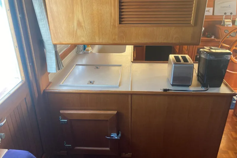Slide: The Image of Galley area of 2002 Grand Banks 42 Classic with toaster and coffee maker. - 11