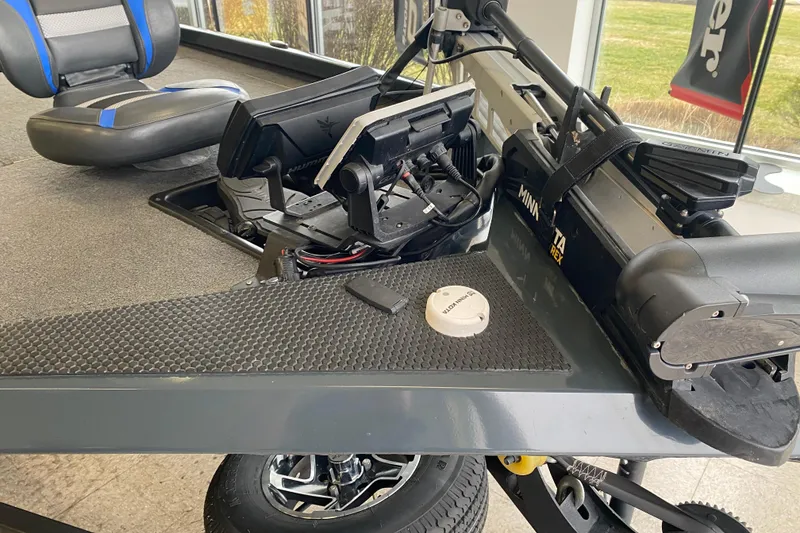 Slide: The Image of 2023 Ranger RT188 boat interior with advanced navigation equipment and seating. - 6