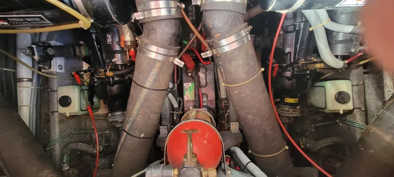Slide: The Image of Engine room of 1988 Sea Ray 340 Express Cruiser. - 11
