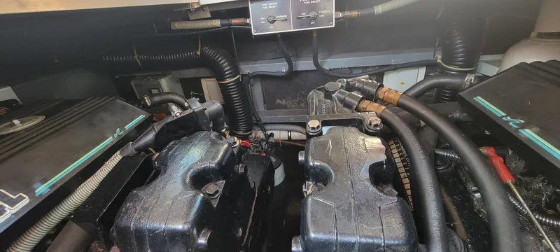 Slide: The Image of Engine compartment of a 1988 Sea Ray 340 Express Cruiser. - 14