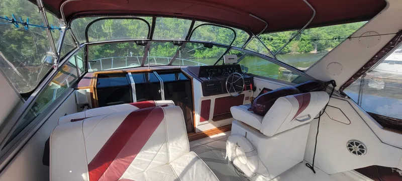 Slide: The Image of Interior of a 1988 Sea Ray 340 Express Cruiser boat. - 16