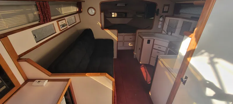 Slide: The Image of Interior of a 1988 Sea Ray 340 Express Cruiser yacht. - 18