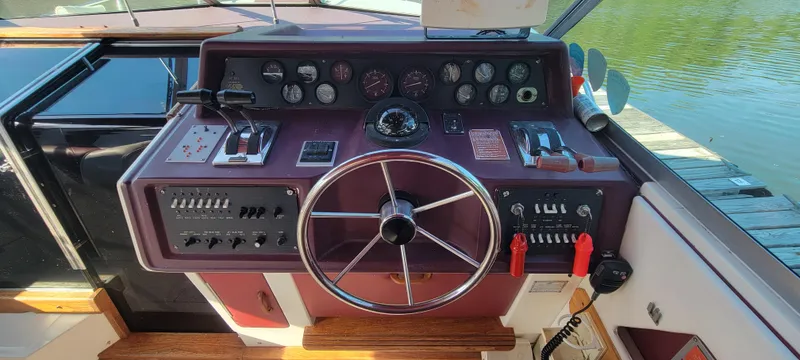 Slide: The Image of 1988 Sea Ray 340 Express Cruiser helm console. - 43
