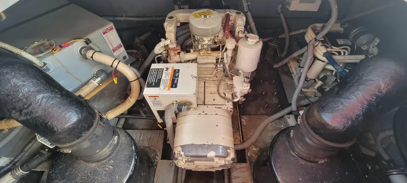Slide: The Image of Engine room of a 1988 Sea Ray 340 Express Cruiser. - 5