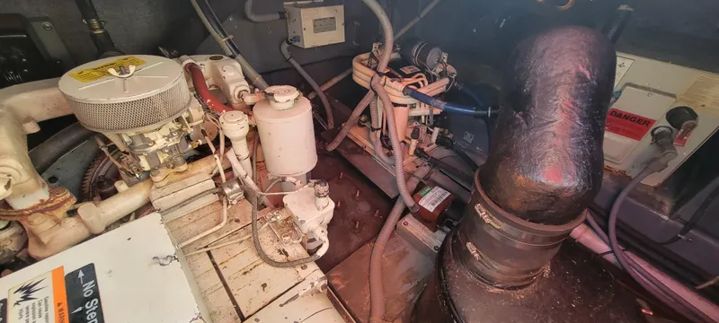 Slide: The Image of Engine room of 1988 Sea Ray 340 Express Cruiser. - 6