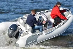 Slide: The Image of Gala Viking V330 boat with Yamaha 25HP engine on water, 2026 model. - 15
