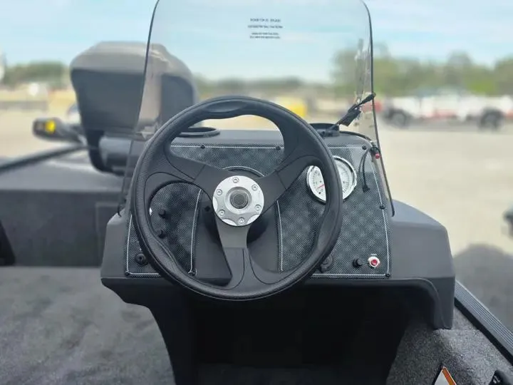Slide: The Image of Steering wheel of 2026 Tracker Bass Tracker Classic XL boat. - 16