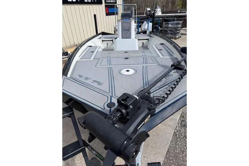 Slide: The Image of 2022 Crestliner 2000 Bay boat with advanced trolling motor, docked outdoors. - 4