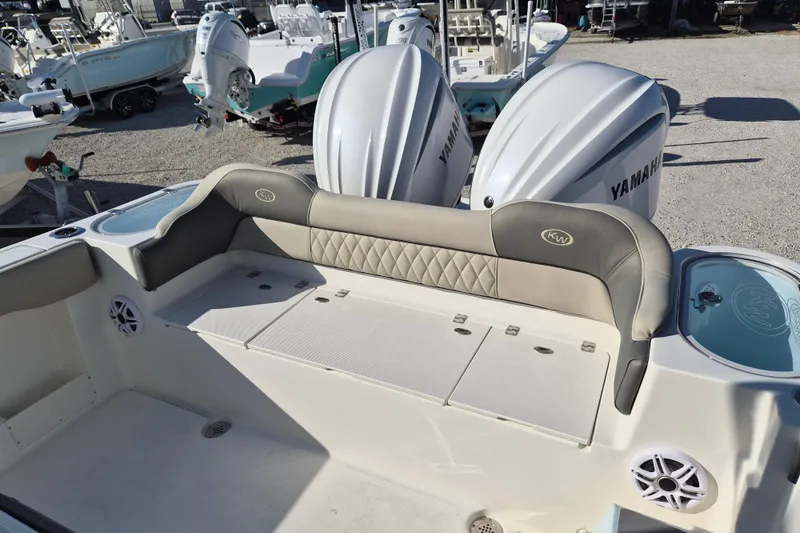 Slide: The Image of 2026 Key West 263 FS boat with dual Yamaha engines and cushioned seating. - 5
