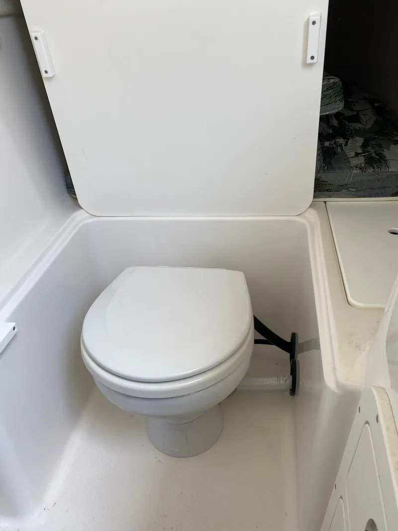 Slide: The Image of Toilet in a 2020 Century 3200 boat. - 11