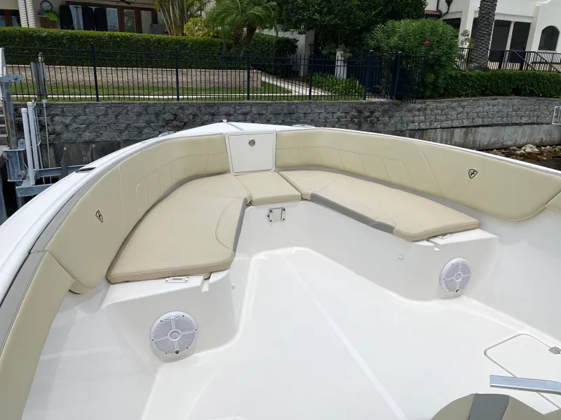 Slide: The Image of Interior view of a 2020 Century 3200 boat with beige seating. - 13