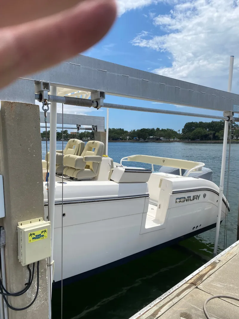 Slide: The Image of Century 3200 boat from 2020 docked on a sunny day. - 18