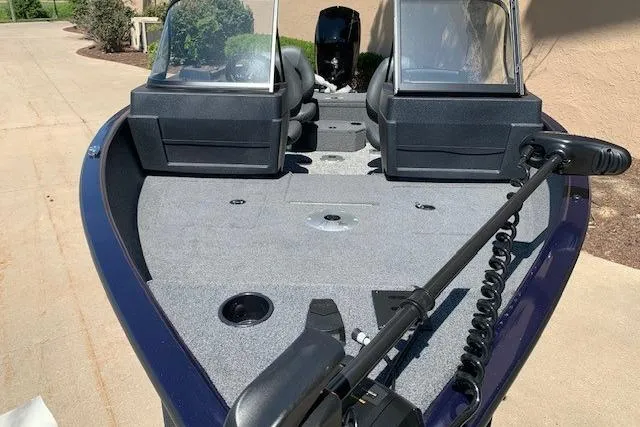 Slide: The Image of 2026 Tracker Pro Guide V-175 WT boat with dual windshields and trolling motor. - 12
