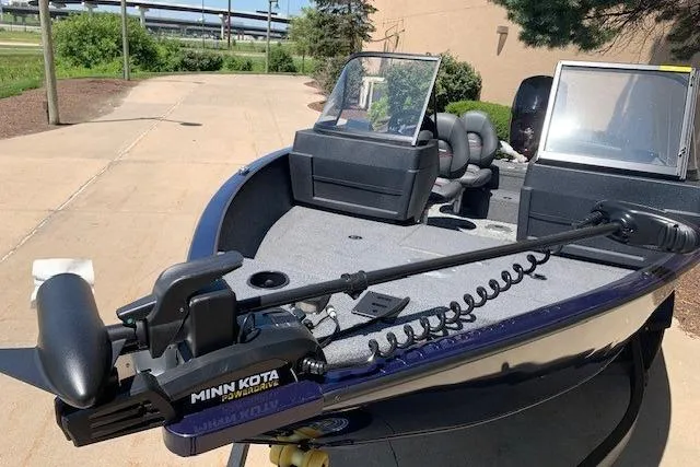 Slide: The Image of 2026 Tracker Pro Guide V-175 WT boat with Minn Kota trolling motor on a sunny day. - 16