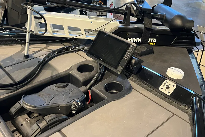 Slide: The Image of Dashboard of 2026 Tracker Savage 215 boat with Minn Kota accessories. - 22
