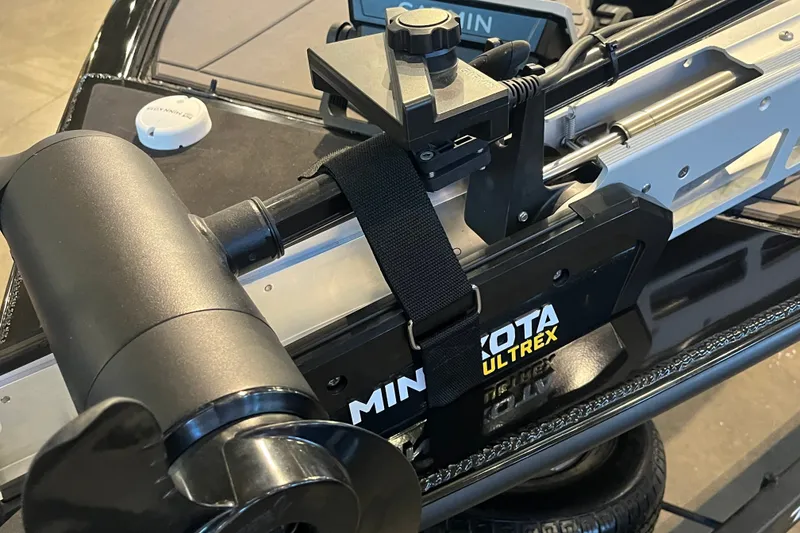 Slide: The Image of Close-up of Minn Kota Ultrex motor on 2026 Tracker Savage 215 boat. - 23