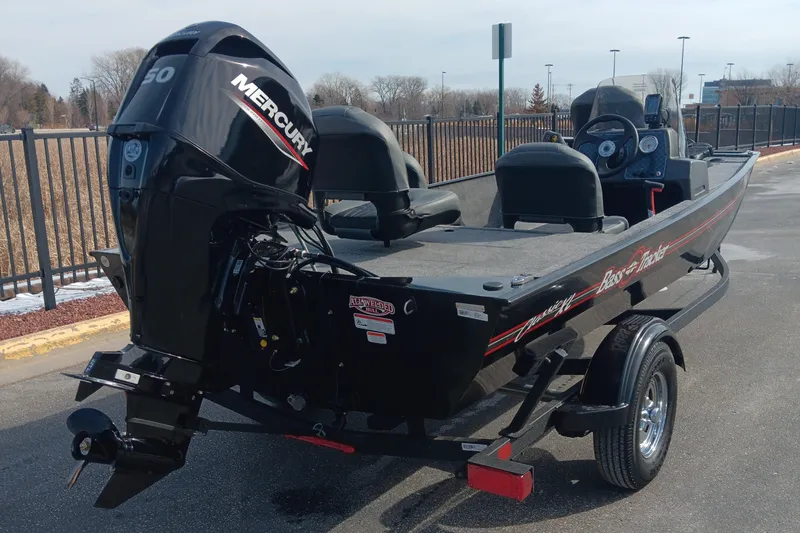 Slide: The Image of 2026 Tracker Bass Tracker Classic XL boat with Mercury engine on trailer. - 61