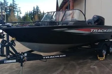 The Image of 2026 Tracker Targa V-19 Combo boat on trailer, parked outdoors. - 0