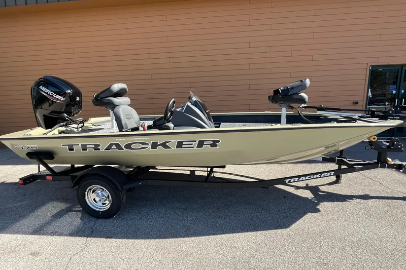 The Image of 2026 Tracker Pro Team 175 Crappie Edition boat on trailer, parked outdoors. - 0