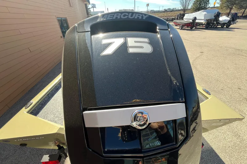 Slide: The Image of 2026 Tracker Pro Team 175 Crappie Edition with Mercury 75 engine, outdoor display. - 3