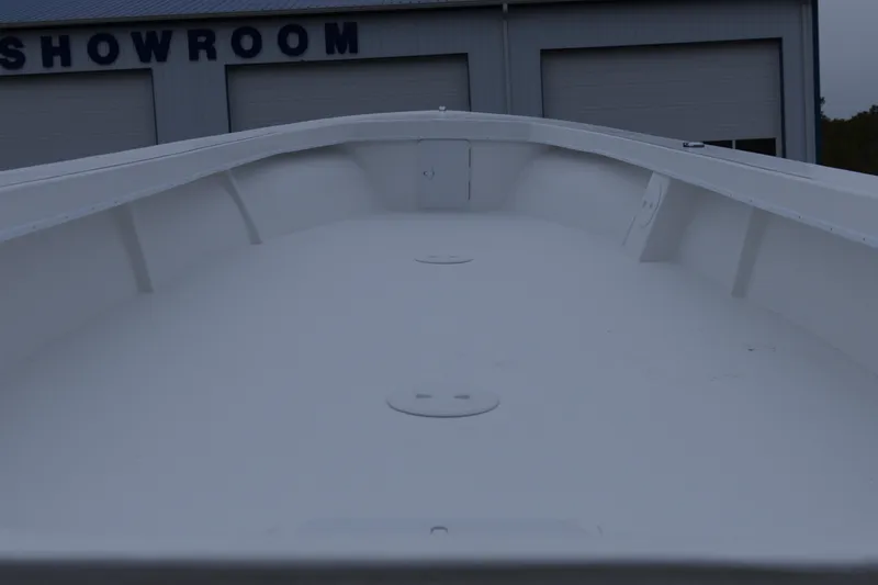 Slide: The Image of 2026 C-Hawk 23 Commercial boat interior, showcased in a showroom setting. - 3