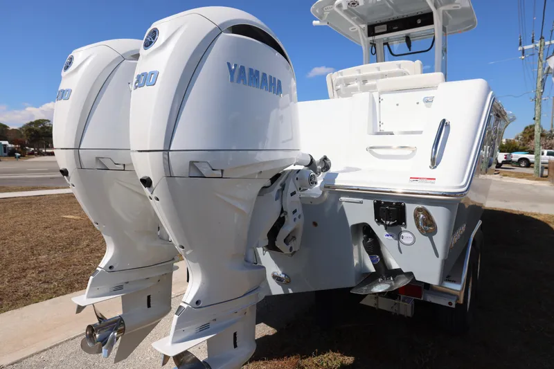 Slide: The Image of 2026 Sea Hunt Gamefish 27 with dual Yamaha engines, rear view. - 28