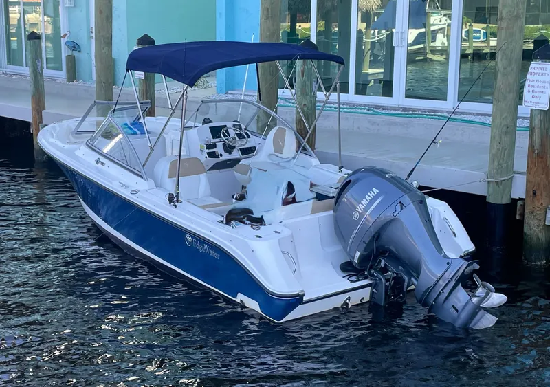 Slide: The Image of 2016 Edgewater 205CX Crossover boat docked with Yamaha engine. - 3