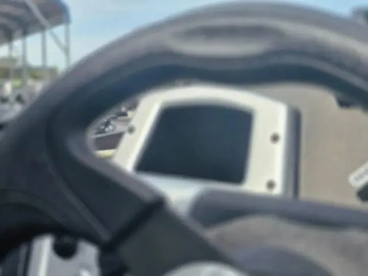 Slide: The Image of Close-up of Tracker Pro Team 175 Crappie Edition 2026 dashboard. - 16