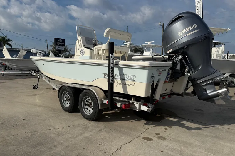 Slide: The Image of 2015 Pathfinder 2200 Tournament Edition boat with Yamaha outboard motor on trailer. - 16
