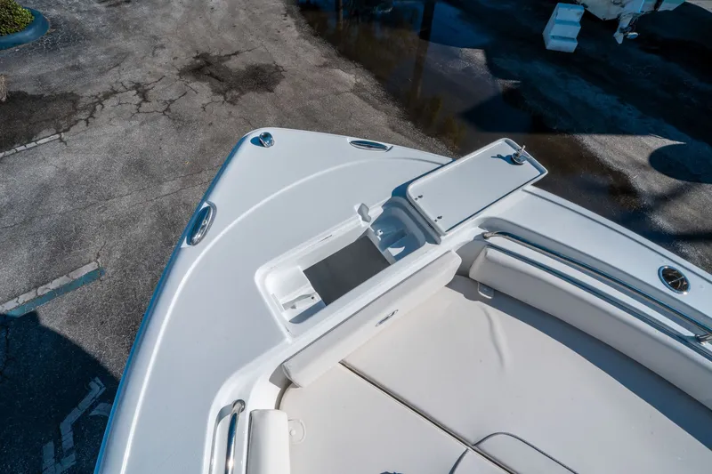 Slide: The Image of Bow of 2026 Sea Hunt Ultra 229 with storage compartment. - 20