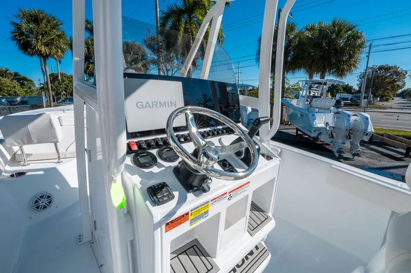 Slide: The Image of Helm console of Sea Hunt Ultra 229 boat, year 2026. - 13