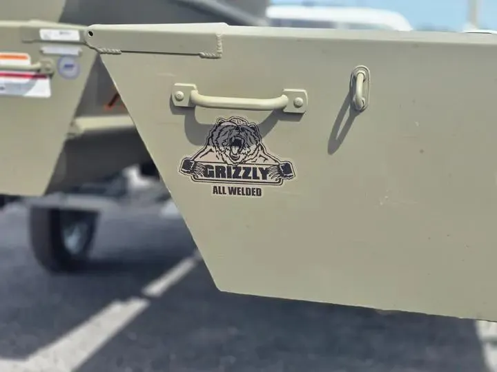Slide: The Image of Tracker Grizzly 14 Jon boat, 2026 model, featuring Grizzly logo. - 5