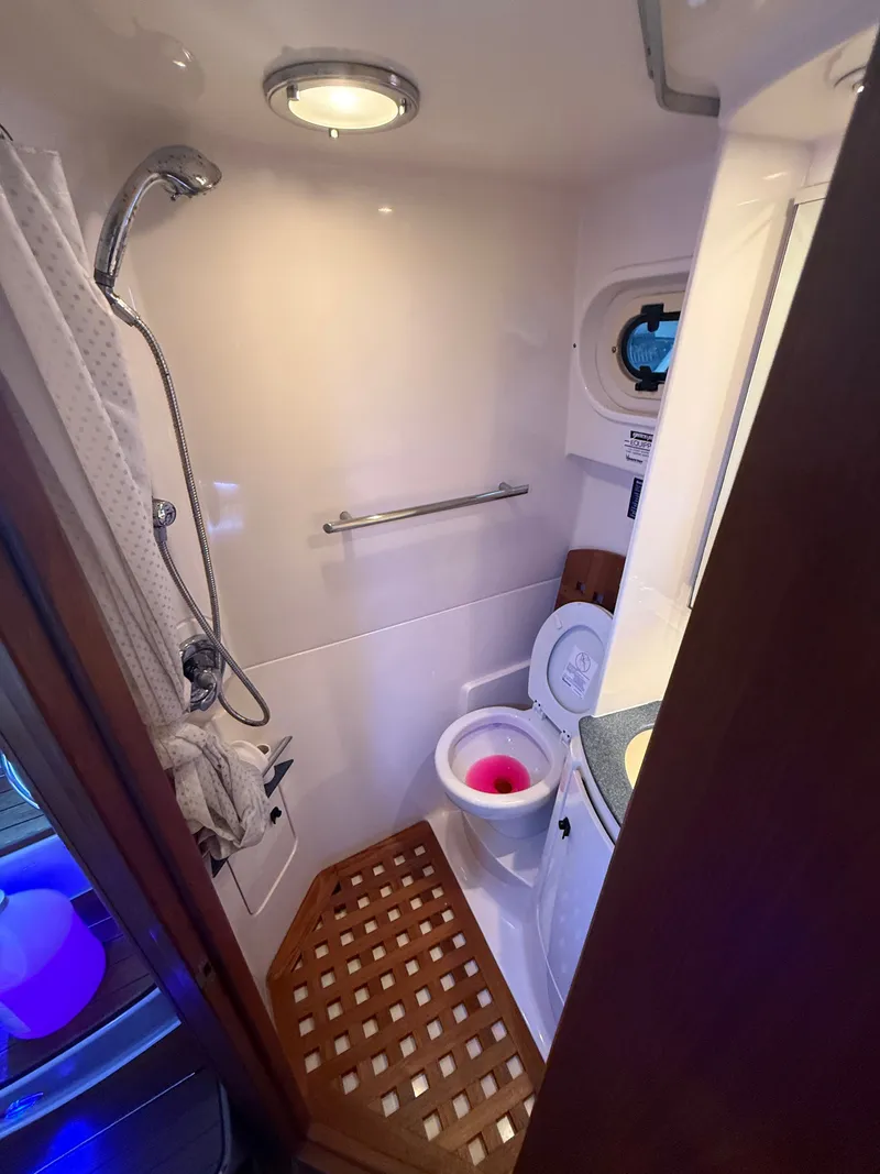 Slide: The Image of Bathroom on a 2003 Pursuit 3400 Express boat. - 15