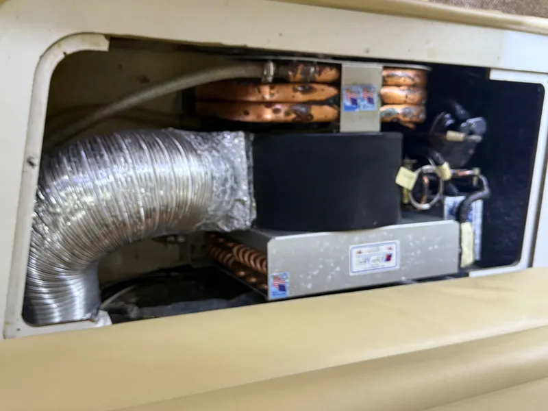 Slide: The Image of Air conditioning unit in 2003 Pursuit 3400 Express boat. - 16