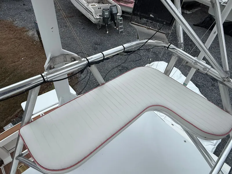 Slide: The Image of Pursuit 3400 Express 2003 boat with elevated seating area. - 38