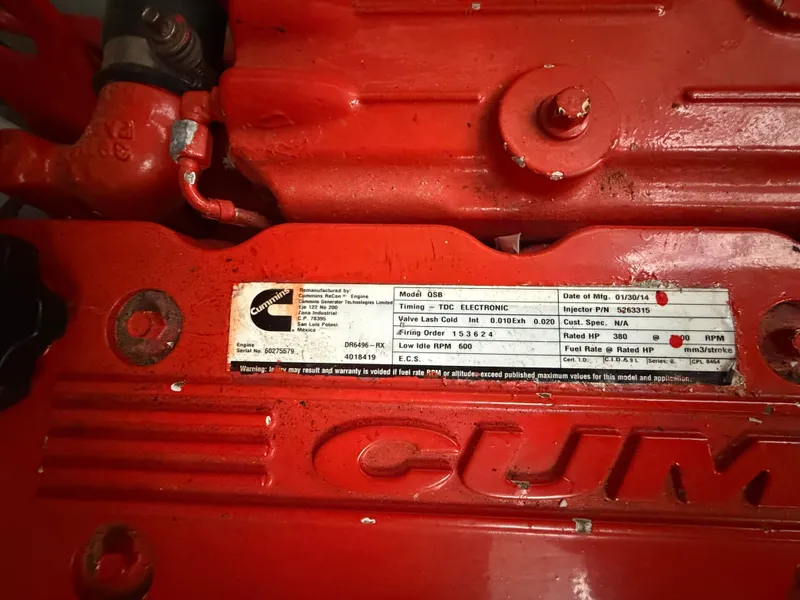Slide: The Image of Red Cummins engine with label, manufactured in 2014. - 6