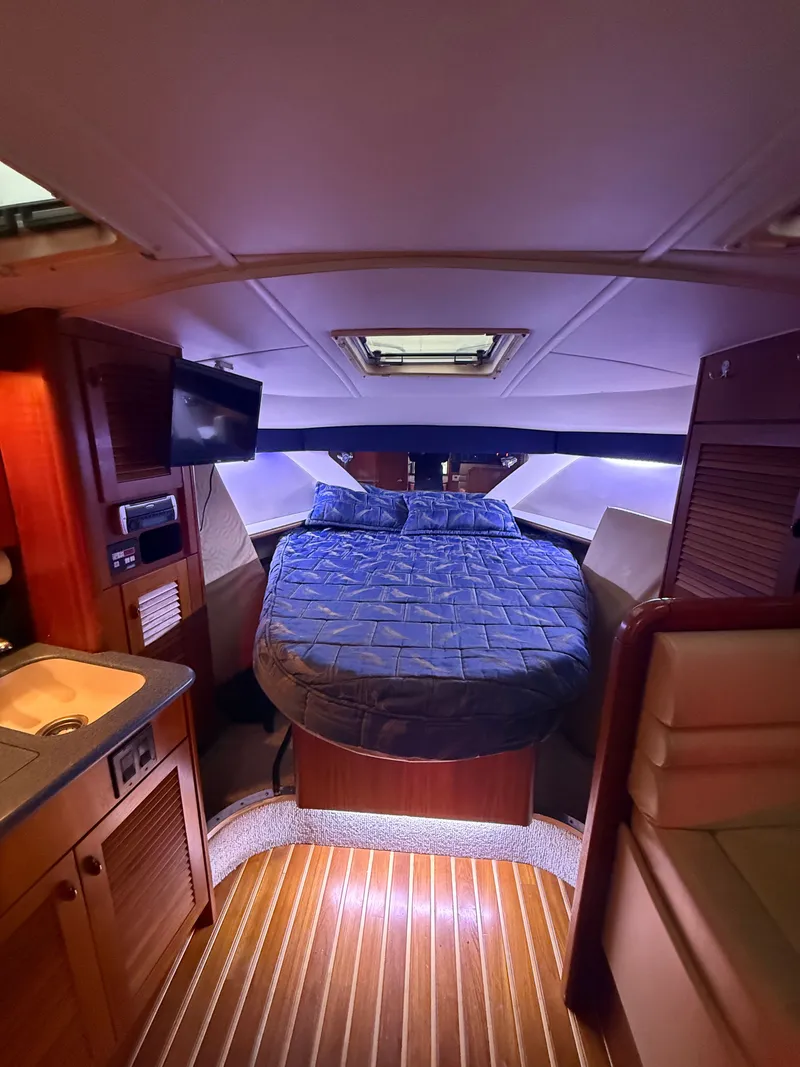 Slide: The Image of Interior of a 2003 Pursuit 3400 Express yacht cabin. - 8