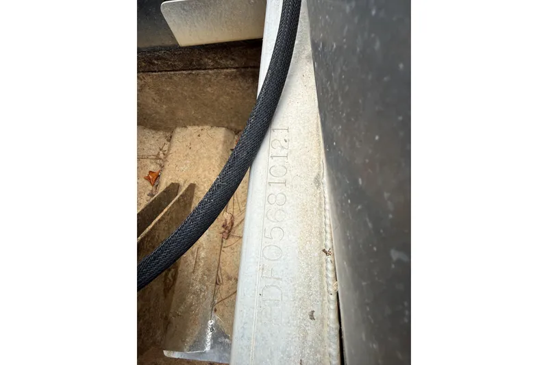 Slide: The Image of Close-up of Barletta C22QC 2021 boat hull identification number. - 22