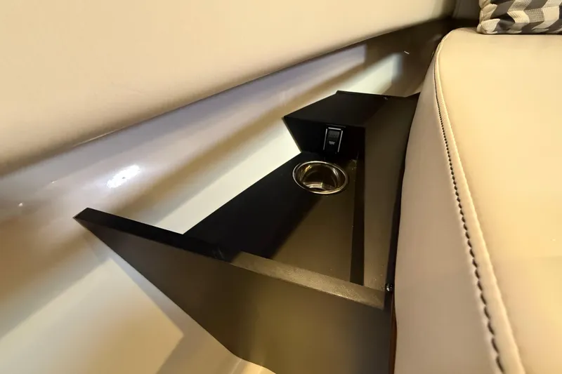 Slide: The Image of Luxurious interior of 2019 Pursuit OS 355 Offshore boat with modern kitchen and seating area. - 20