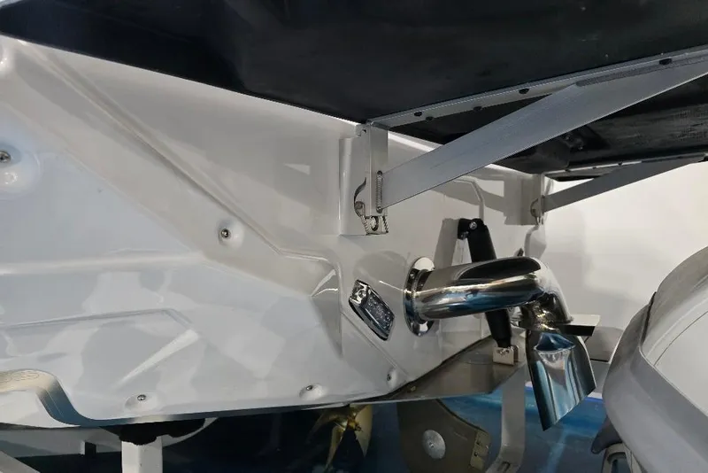 Slide: The Image of 2024 Nautique Super Air Nautique GS20 boat exhaust and hull detail. - 13
