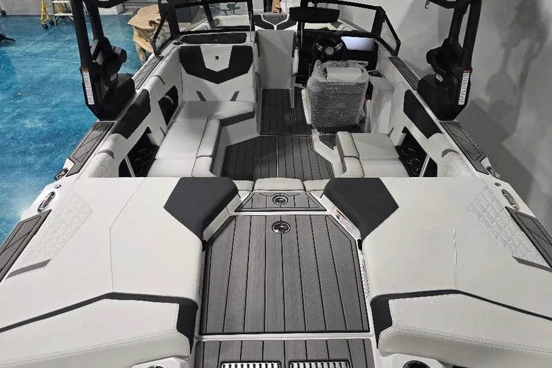 Slide: The Image of 2024 Nautique Super Air Nautique GS20 interior with sleek seating and modern design. - 15
