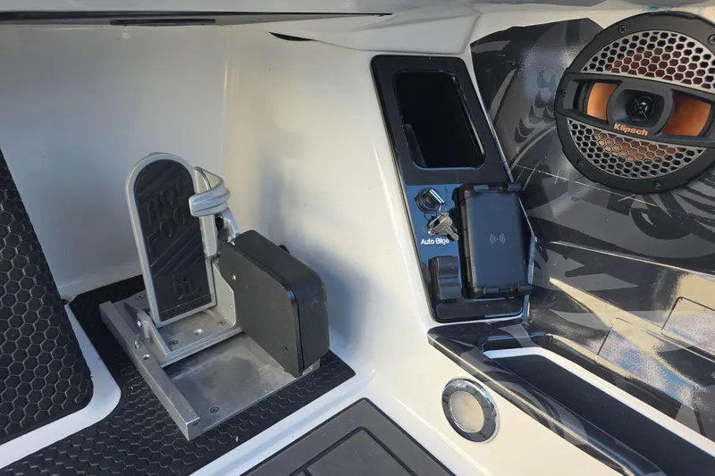 Slide: The Image of Interior of iKon LX21 (2025) featuring pedal, speaker, and control panel. - 12