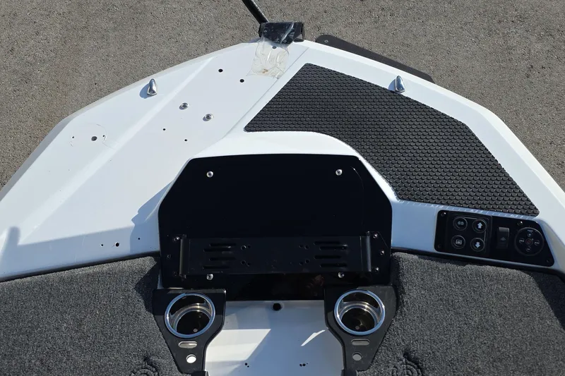 Slide: The Image of iKon LX21 2025 boat dashboard with cup holders and control panel. - 15