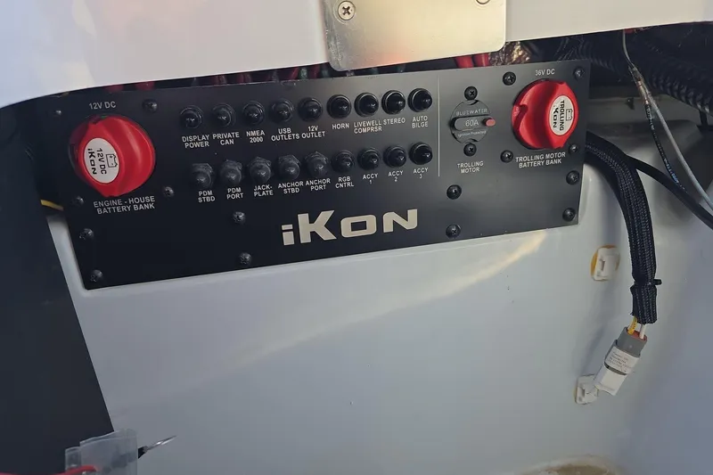 Slide: The Image of iKon LX21 2025 control panel with switches and battery connections. - 21