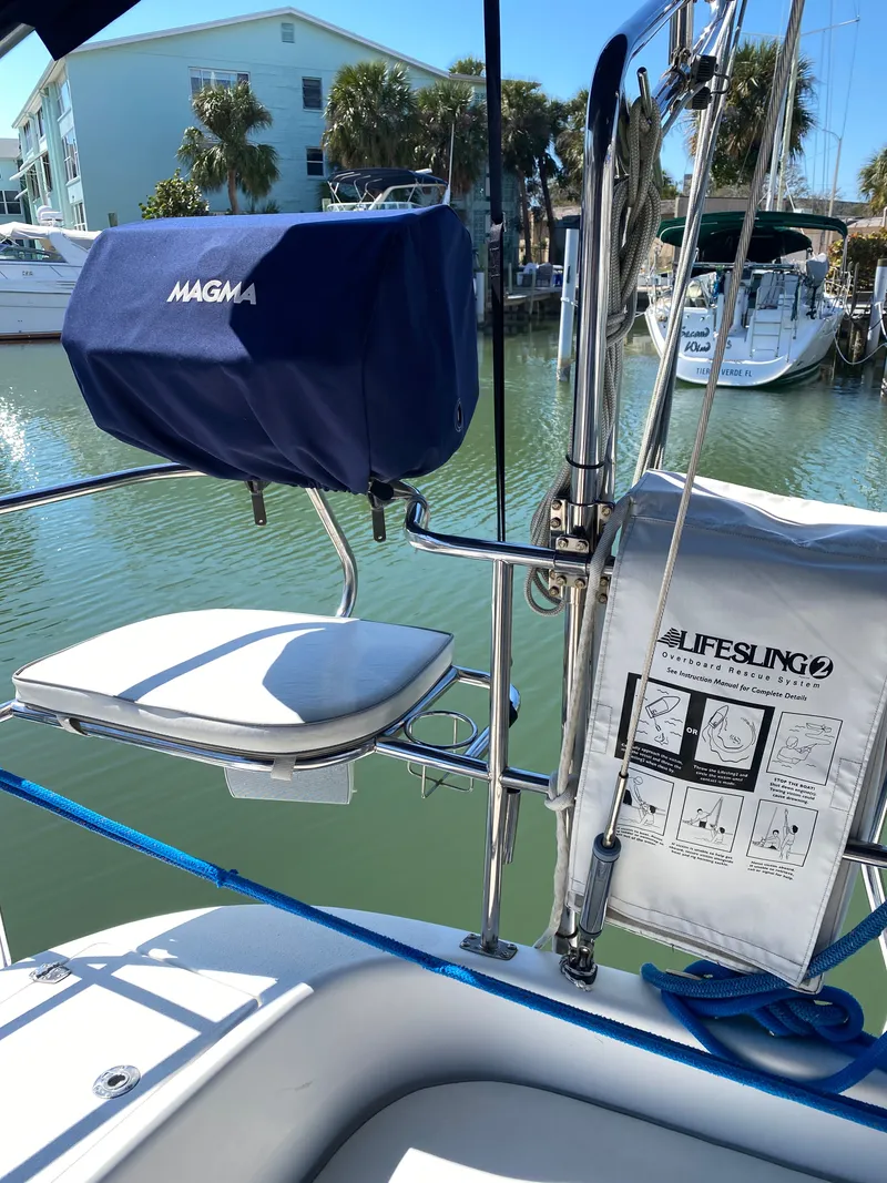 Slide: The Image of Catalina 350 sailboat with Magma grill and Lifesling rescue system. - 11