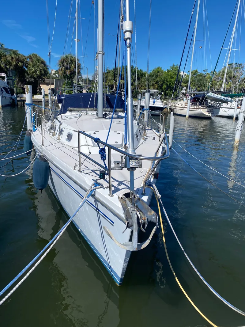 Slide: The Image of 2003 Catalina 350 sailboat docked in marina. - 2