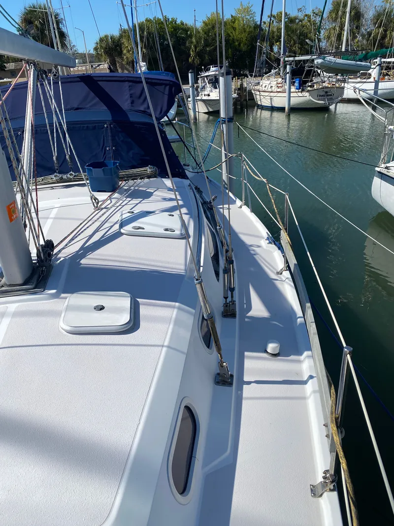 Slide: The Image of Deck of a 2003 Catalina 350 yacht in harbor. - 6