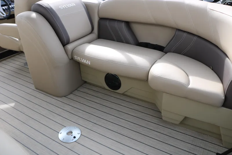 Slide: The Image of Luxurious seating on 2026 Sylvan Mirage 822 LZ pontoon boat with beige upholstery. - 21