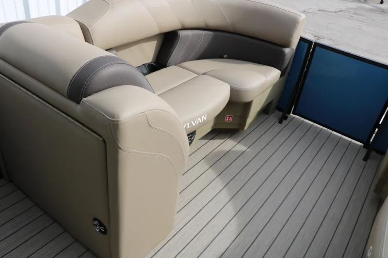 Slide: The Image of Luxurious seating on 2026 Sylvan Mirage 822 LZ pontoon boat, featuring beige upholstery. - 23